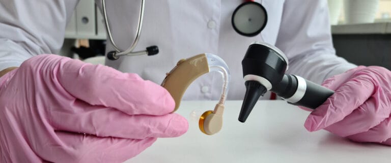 Hearing checks at the ENT and hearing aid. Hearing test result audiogram hearing aids and otoscope